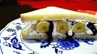 Sandwich with Banana, Chocolate Syrup & Whipped Cream